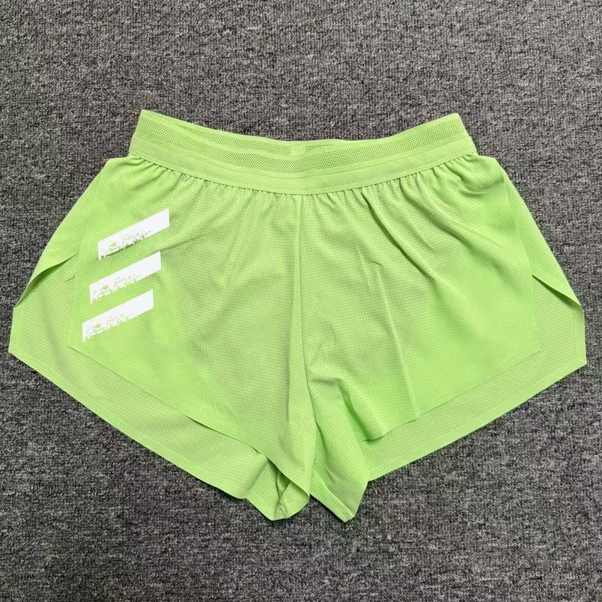 スポーツランニング三分トレーニングパンツ男性プロマラソン側開帯ライニング速乾通気陸上パンツ