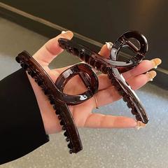 韓国のレイ透の黒いクリップの髪の質感はシンプルです。
