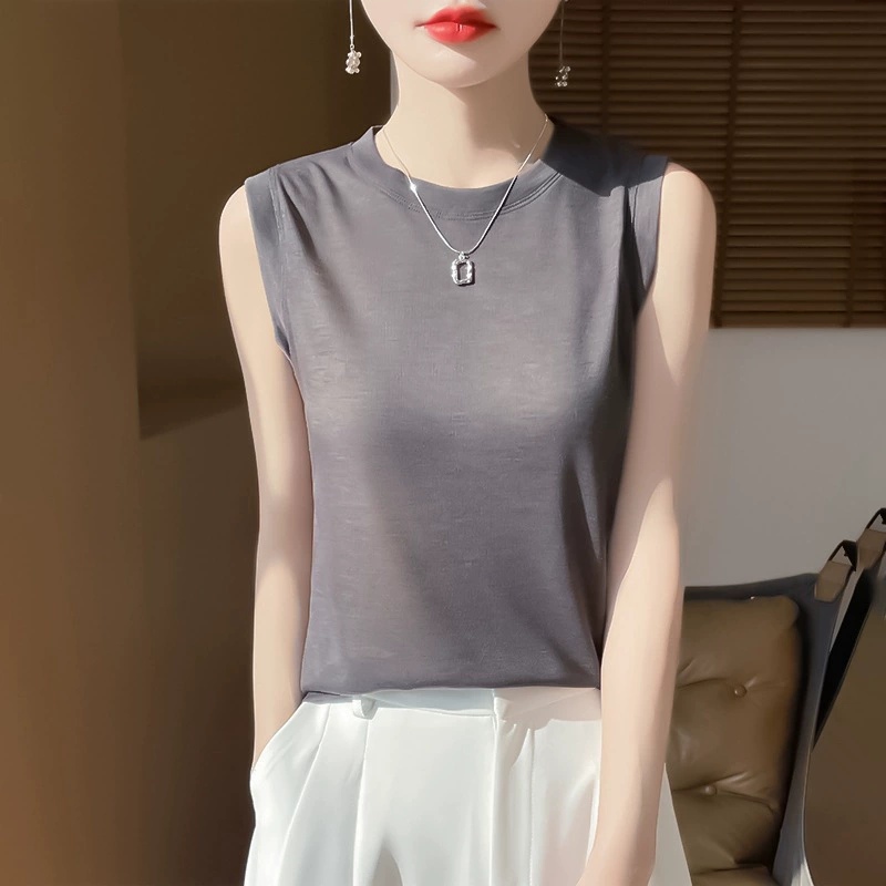 Новый блузок с круглым вырезом и трикотажным жилетом без рукавов весной и летом 2025 года