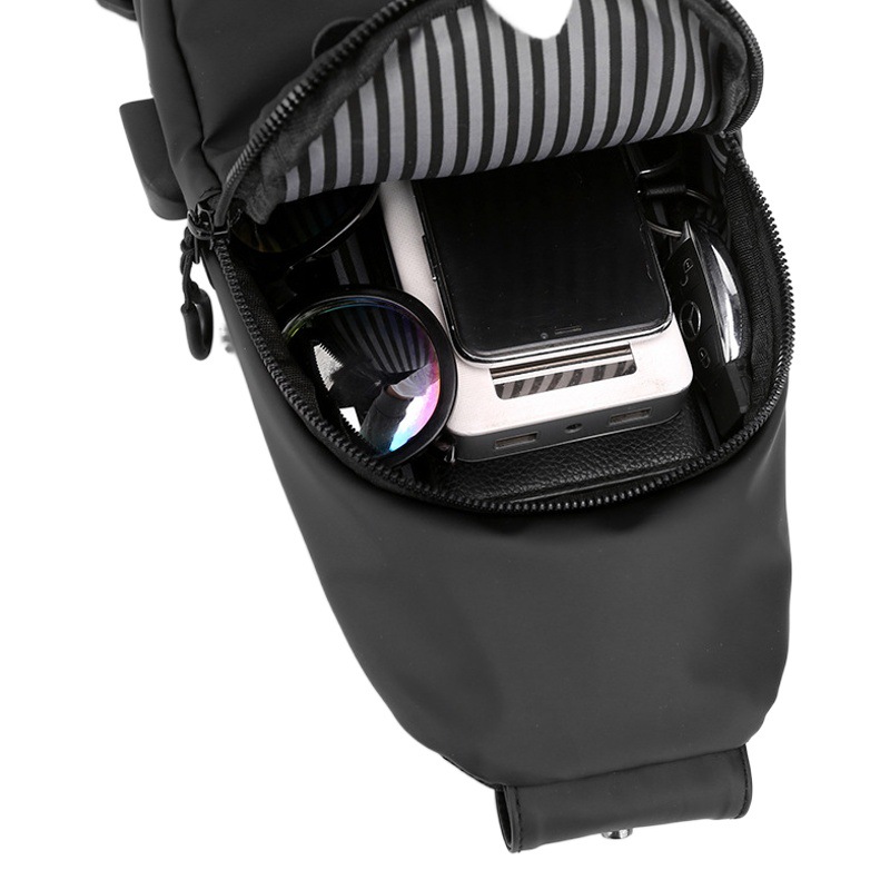 Bolso de pecho al aire libre transfronterizo de los nuevos hombres bolso de pecho USB de la moda europea y americana deportes bolsa de mensajero impermeable mochila de negocios