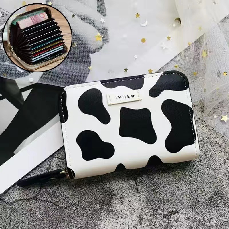 Vaca en blanco y negro: 18 tarjetas + 2 monedas