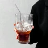 Fruit tea, tea cup, glass straw, wide neck