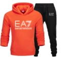 Orange + black pants + white label