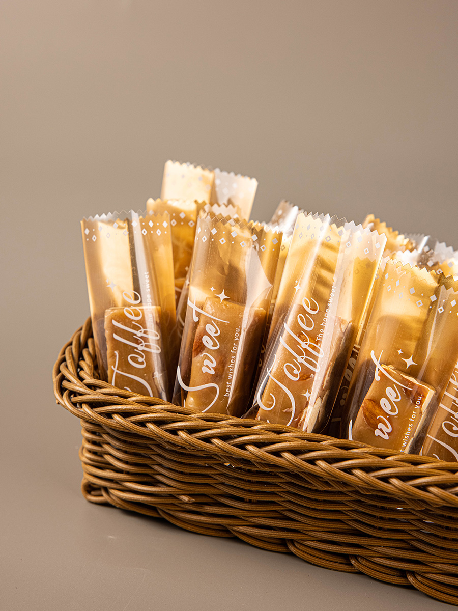 Nueva bolsa de embalaje transparente simple de caramelo de toffee nougat bolsas de sello de máquina de azúcar de café bolsas de sello de nieve crisp bolsas de sello independientes