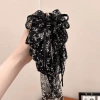 50# black and white floral ponytail clip