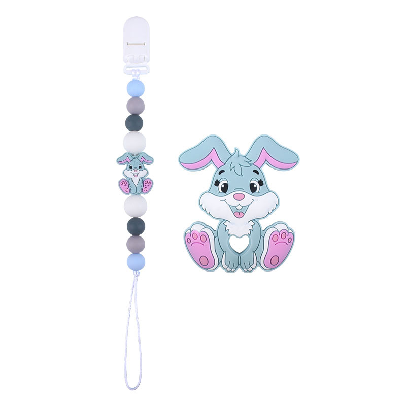Amazon nuevo bebé suministros de dibujos animados conejo de silicona juguete mordedor pezón anti-gota cadena molar traje