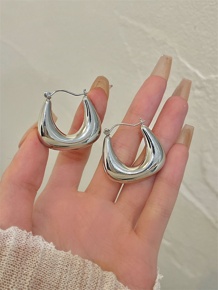 Metal U-Shaped Earrings - Close-Up