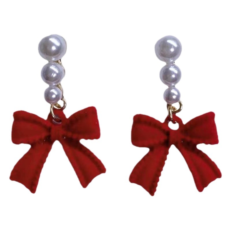 S925 aguja de plata Corea del Sur vintage rojo flocado arco pendientes de perlas pendientes nicho luz de lujo pendientes de felpa