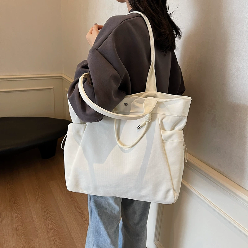 Легкая вместительная сумка-тоут для женщин, новая универсальная повседневная сумка для путешествий на короткие расстояния с множеством карманов, сумка через плечо в стиле «ленивый шик».