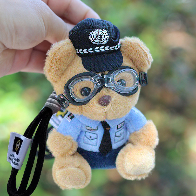 Policía bombero oso muñeca celebridad de Internet caballo de hierro muñeca coche de peluche policía de tránsito colgante oso de peluche llavero lindo
