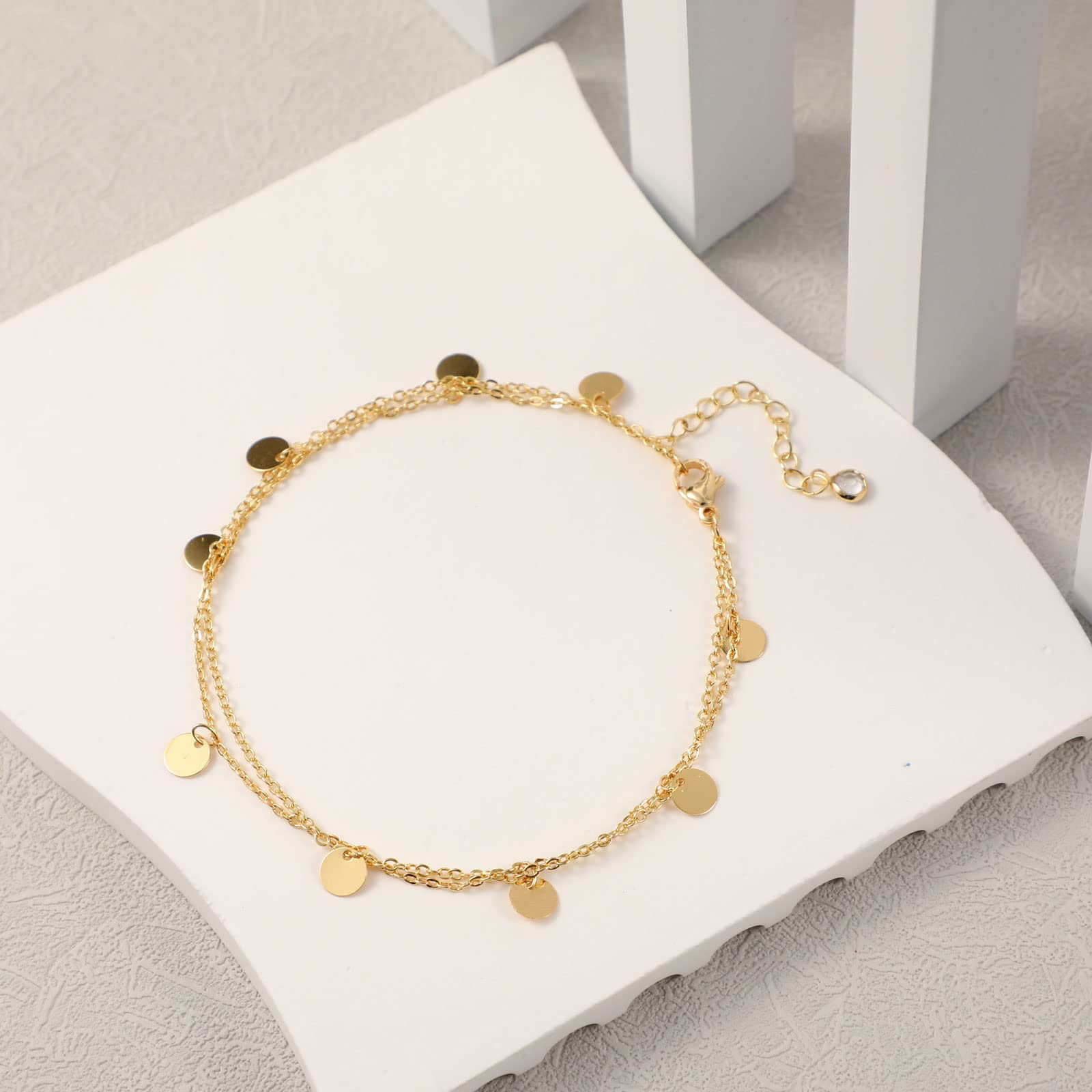 Cavigliera dorata a doppio strato con ciondolo rotondo elegante_voghion.com