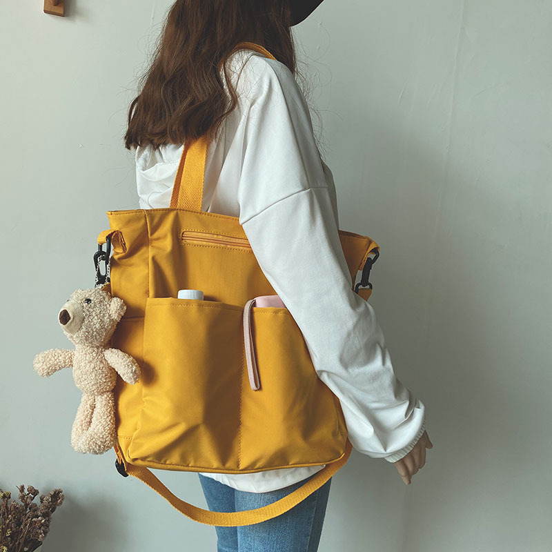 Bolsa de lona impermeable bolsa de hombro de verano para mujer bolsa de gran capacidad para mujer bolsa de mensajero para estudiantes universitarios