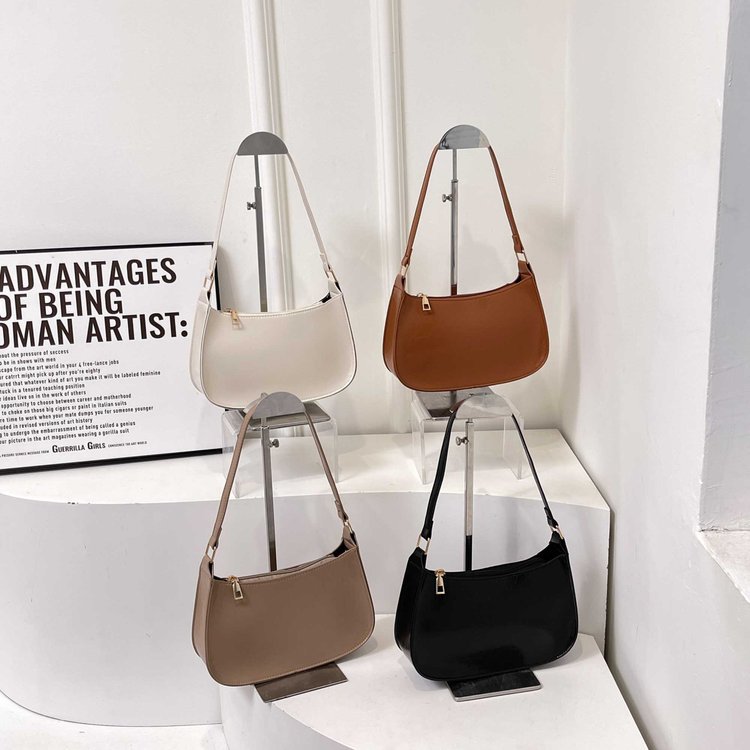 Niche Zhong retro bolso de braza, bolso de alta calidad, nuevo estilo de bolso de viaje, bolso de hombro de moda de gran capacidad.