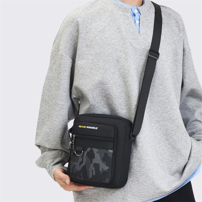 Bolso de hombro de viaje ligero y simple para hombres, bolso de hombro a prueba de derrames, bolso de moda para hombres de negocios