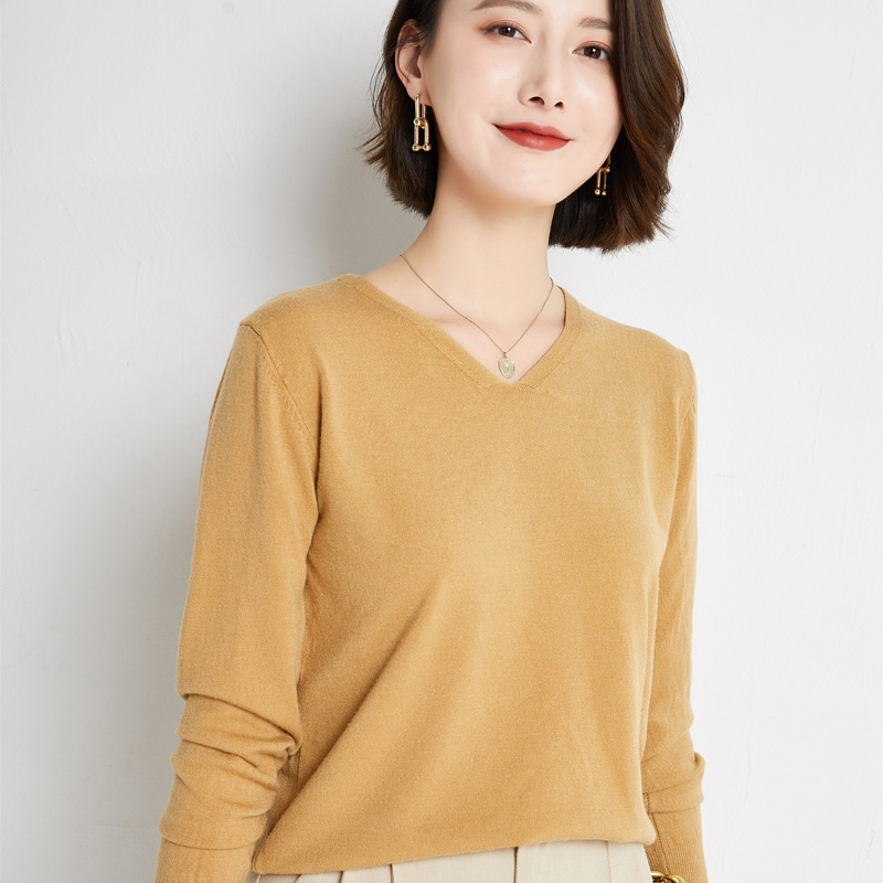 Otoño e Invierno nuevo estilo occidental con cuello en V color sólido manga larga suéter de fondo interior simple desgaste exterior suéter de cuello de pollo para mujeres