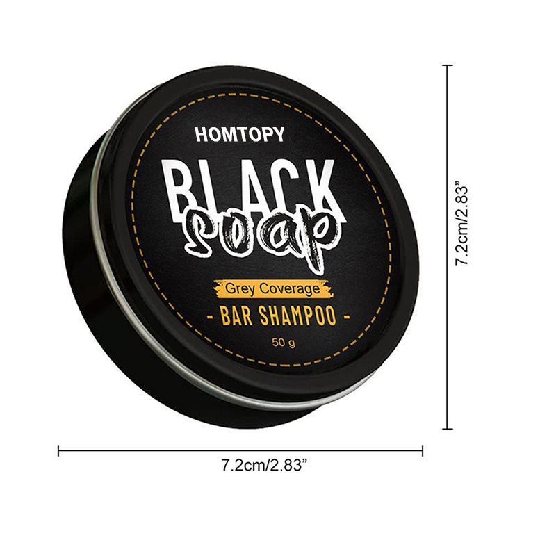 Homotopy men’s grey coverage bar shampoo for dark hair 50g in a sleek black tin with gold stitching accents and white lettering.