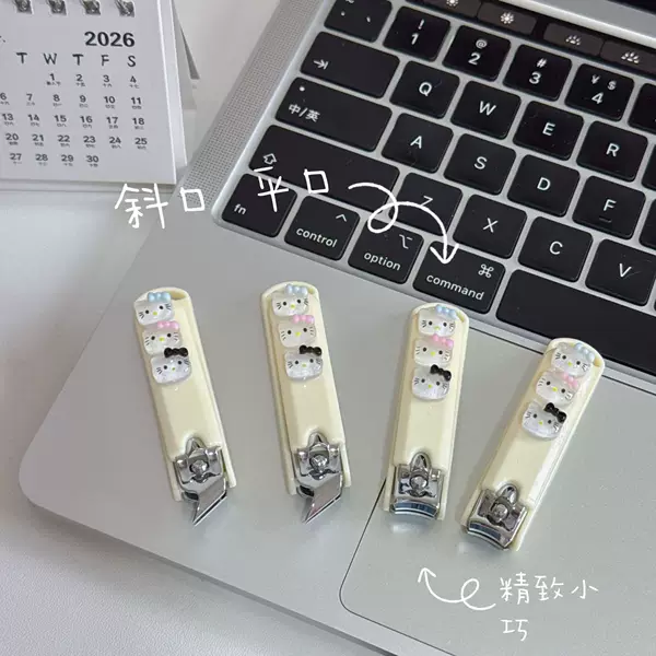 New cartoon cute kitten nail clippers, high aesthetic value, portable household nail scissors, angled nail cutter