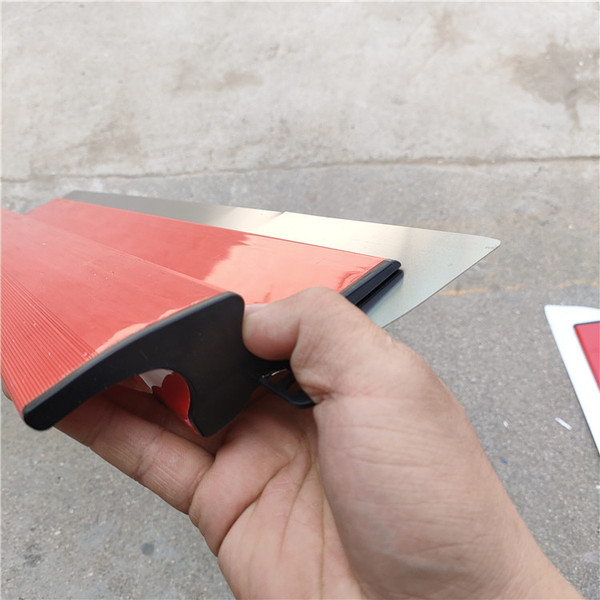 Red scraping putty finds a flat artifact scraper German scraper…