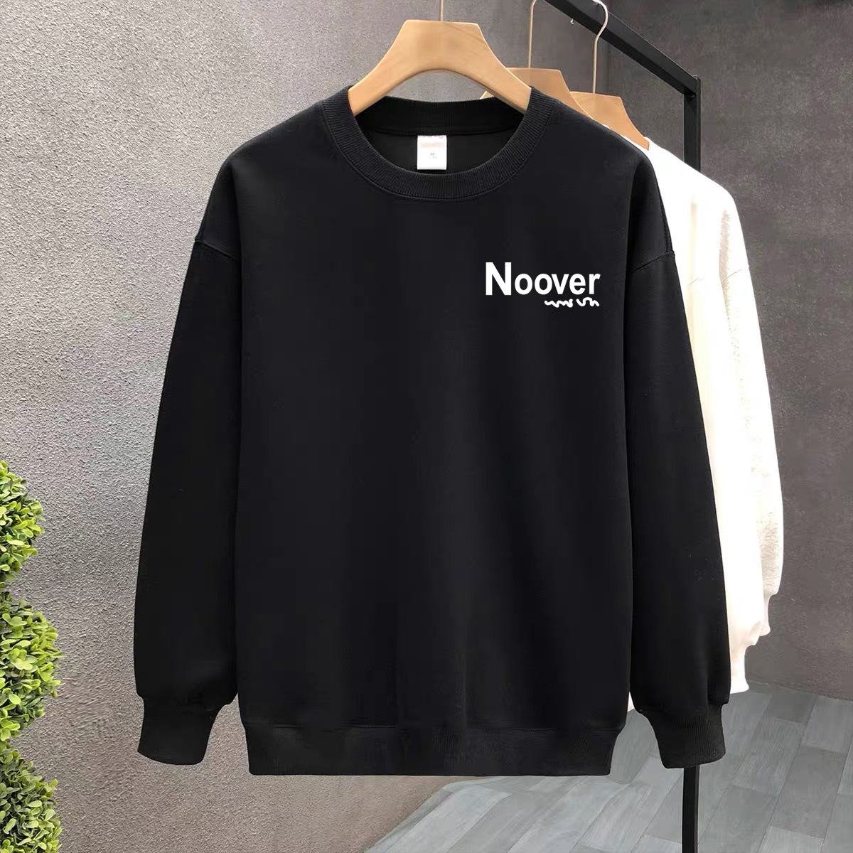 Suéter de algodón negro pesado de alta gama para mujeres 2025 otoño y invierno nuevo estilo europeo y americano camiseta de manga larga fondo suéter de estudiante