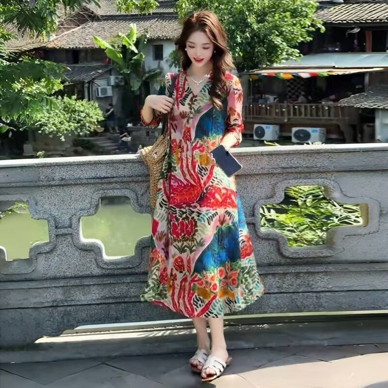 Light luxury and stylish resort-style printed V-neck dress, summer loose-fitting slimming French-style A-line long dress Light luxury and stylish resort-style printed V-neck dress, summer loose-fitting slimming French-style A-line long dress