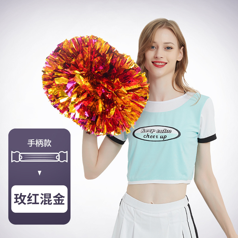 花のボールの応援団の手の花の手の手の花の運動会の手は道具の応援の道具の現物を持ちます。|undefined