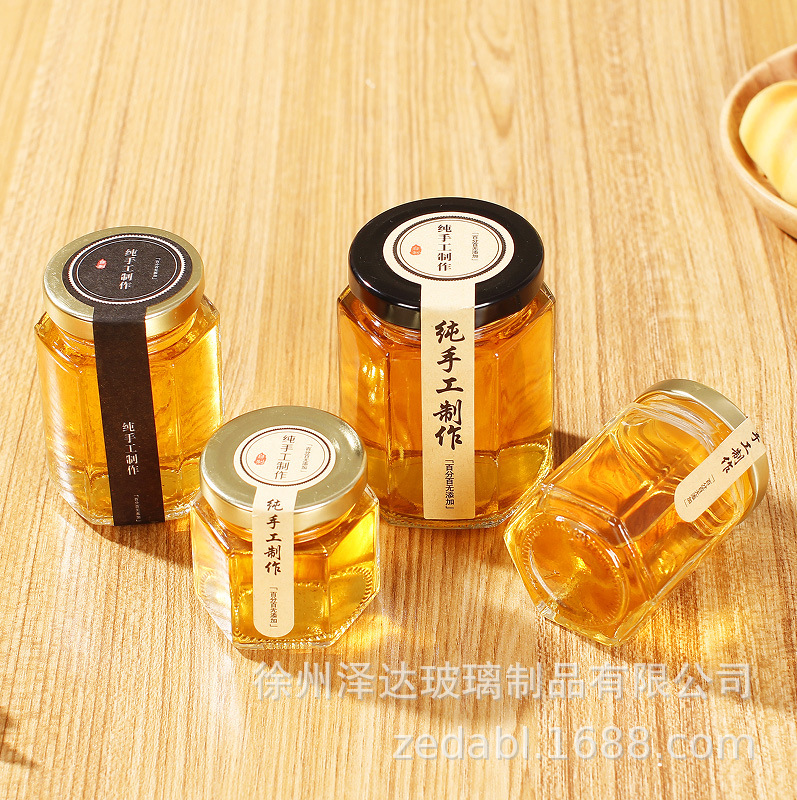 批发六棱玻璃瓶罐蜂蜜玻璃瓶酱菜包装六角瓶蜂蜜罐空密封泡沫盒个
