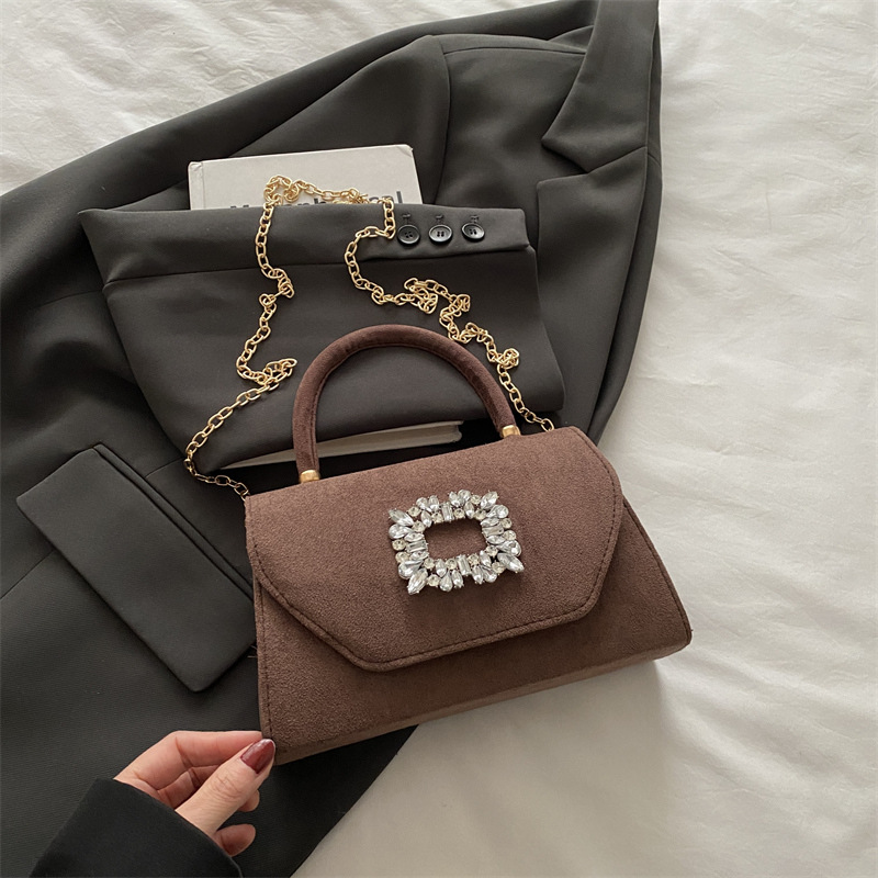 Versión coreana de simple y elegante color sólido 2025 verano nuevo casual cadena de cercanías bandolera bolso cuadrado pequeño de diamante brillante