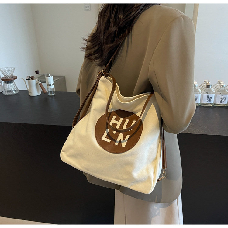 Korean letter printed multi-purpose cloth bag, 2024 new style, high-quality student backpack, commuting single-shoulder bag undefined