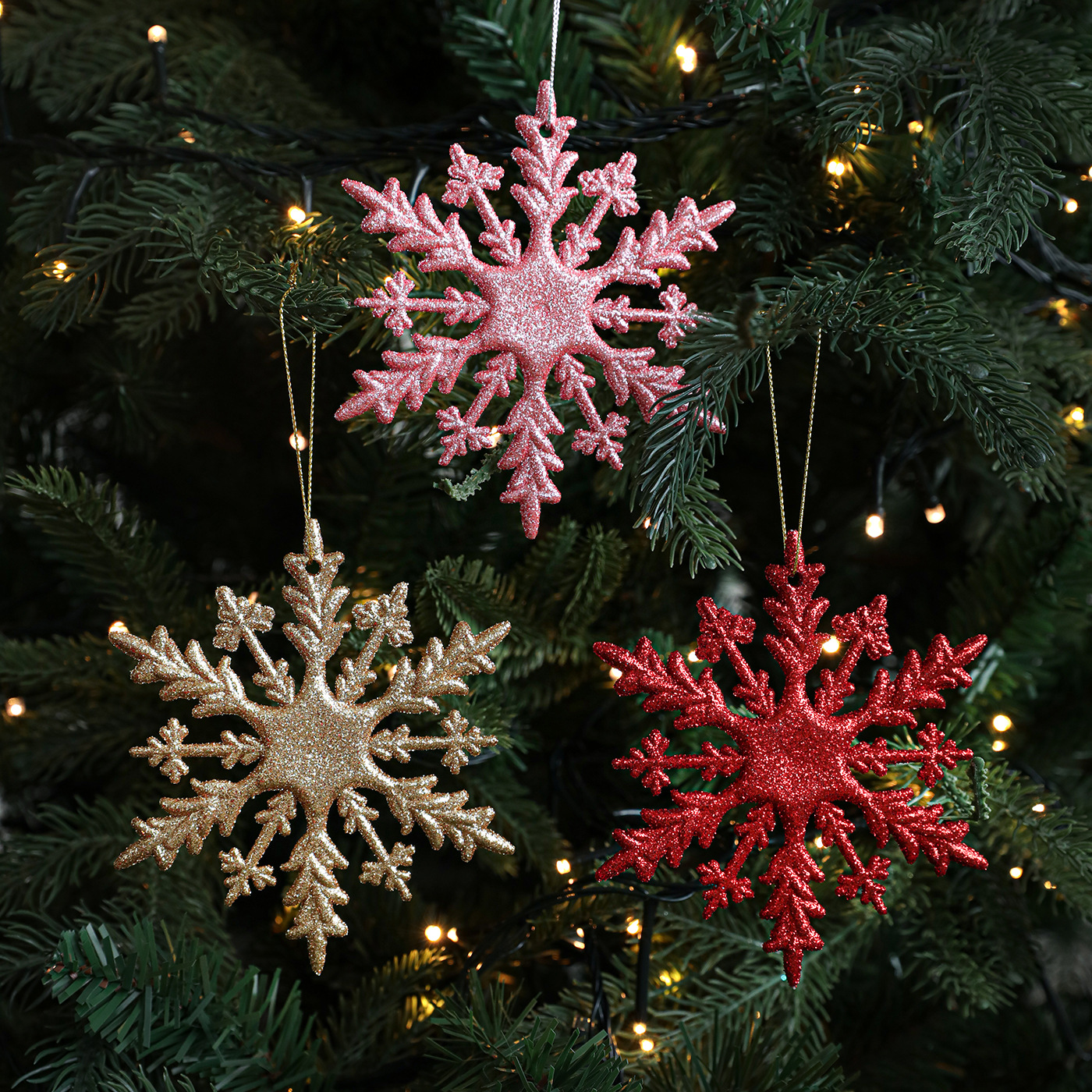 Nuevo transfronterizo 11CM plástico adhesivo flocos de nieve colgante caja de árbol de Navidad accesorios de decoración accesorios de color