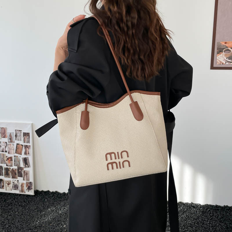 Nuevo tipo transfronterizo de gran capacidad de moda retro versátil de alto valor de la cara bolsas de hombro bolsas especiales para estudiantes universitarios