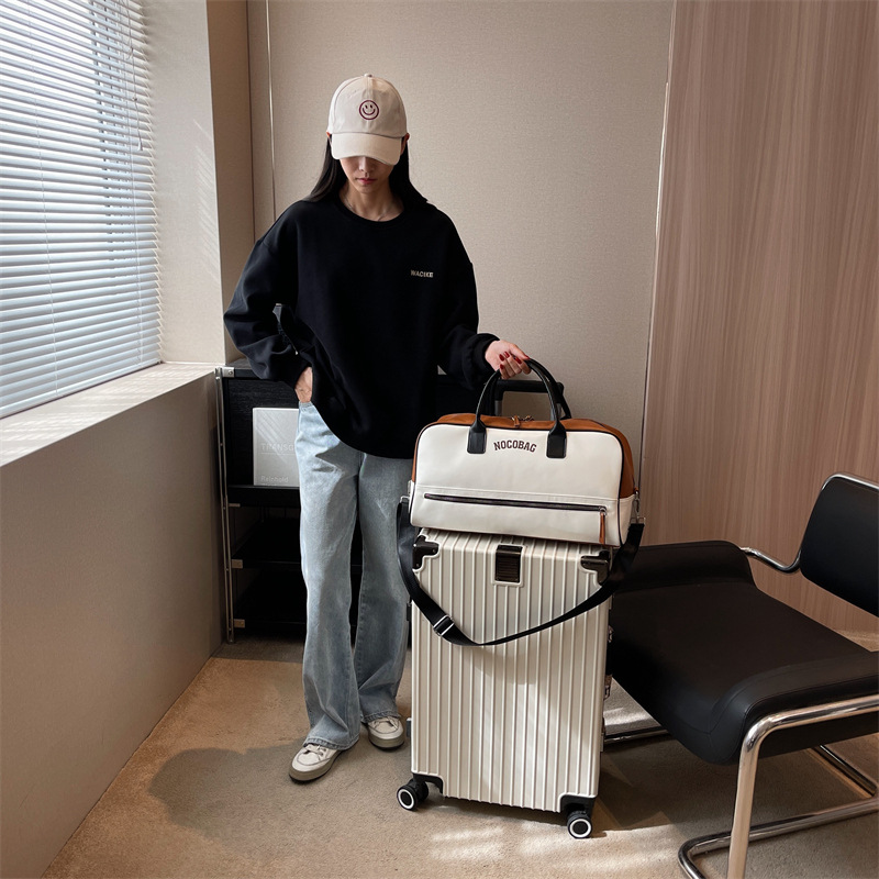 Bolsa de equipaje de gran capacidad de viaje de negocios de corta distancia Nueva bolsa de viaje de color de contraste de moda bolsa de almacenamiento de ropa portátil simple de un hombro