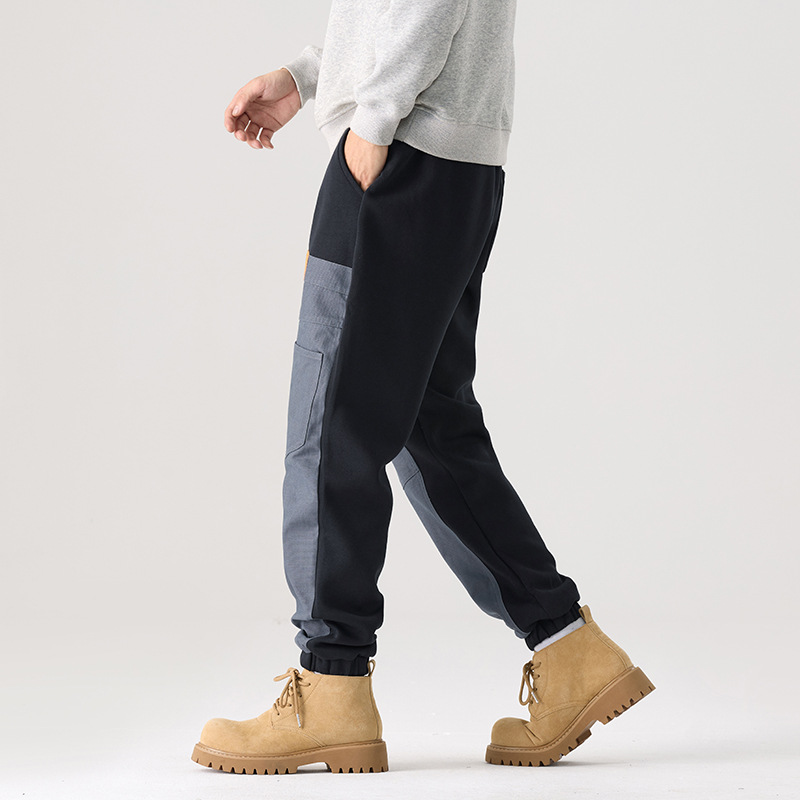 Mick Jones 2025, nuevos pantalones casuales de otoño, pantalones de guardia de hombre, pantalones grandes, pantalones de moda con etiquetas colgantes.