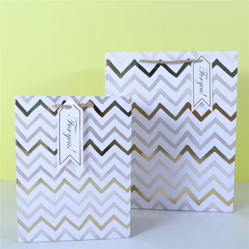 Hot gold white card gift packaging bag five-pointed star shopping bag Polish pattern series paper bag wholesale gift bag