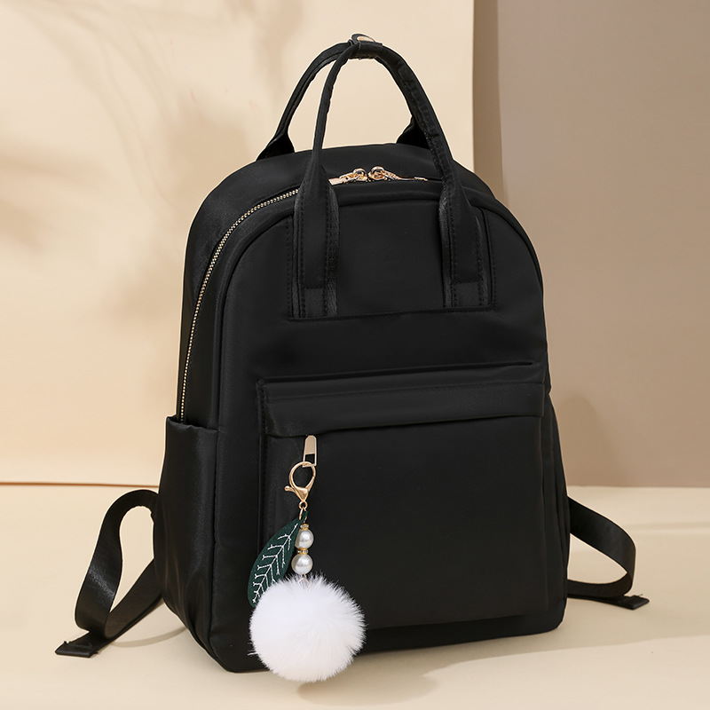 Mochila multiusos de gran capacidad para viajeros, nueva moda de color sólido, mochila de tela Oxford simple y versátil, viaje de gran capacidad