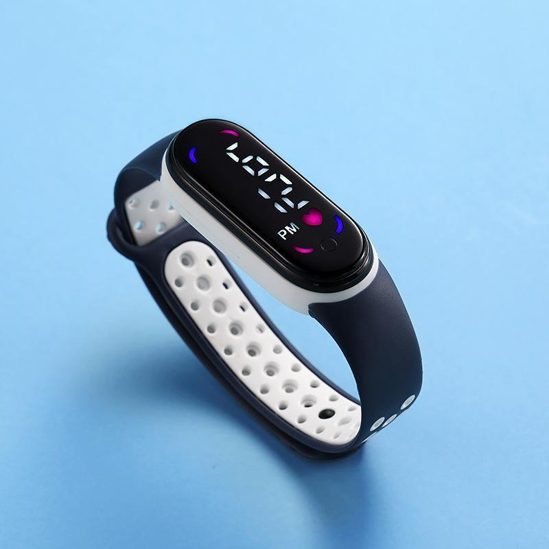 Comercio exterior Venta caliente 50 m natación M7 doble color con LED reloj electrónico niños estudiante deportes impermeable mano táctil