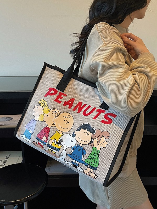 Bolsa de lona para mujeres 2026 nueva versión coreana de gran capacidad de mochila de viaje impresa de dibujos animados bolsas de mano de viaje