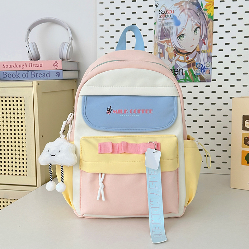 Mochila escolar de estudiante de doble bolsillo con letras de estilo universitario Versión coreana de la mochila de gran capacidad para estudiantes de secundaria y preparatoria al por mayor para niñas de alto valor
