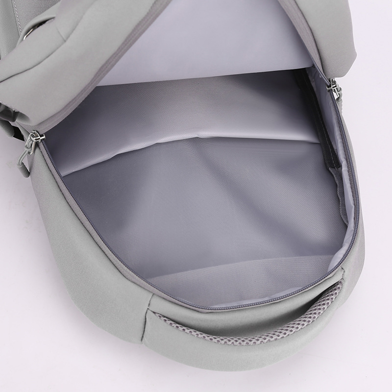 2023 nueva mochila recargable USB coreana moda nailon de gran capacidad para viajes de negocios mochila para computadora al por mayor