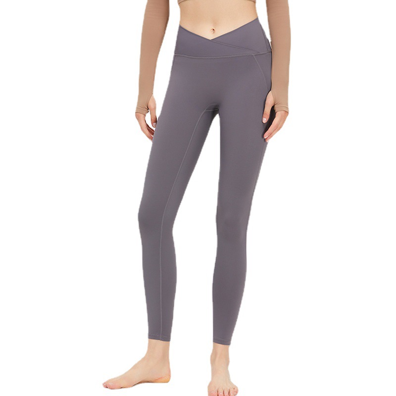 Nueva Cruz cintura fitness pantalones melocotón levantamiento de la cadera Pantalones deportivos mujeres cintura alta vientre contratación sin T línea nude yoga Pantalones