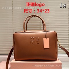2025春夏新款miu谬家牛皮手提保龄球通勤公文包女电脑包大容量包