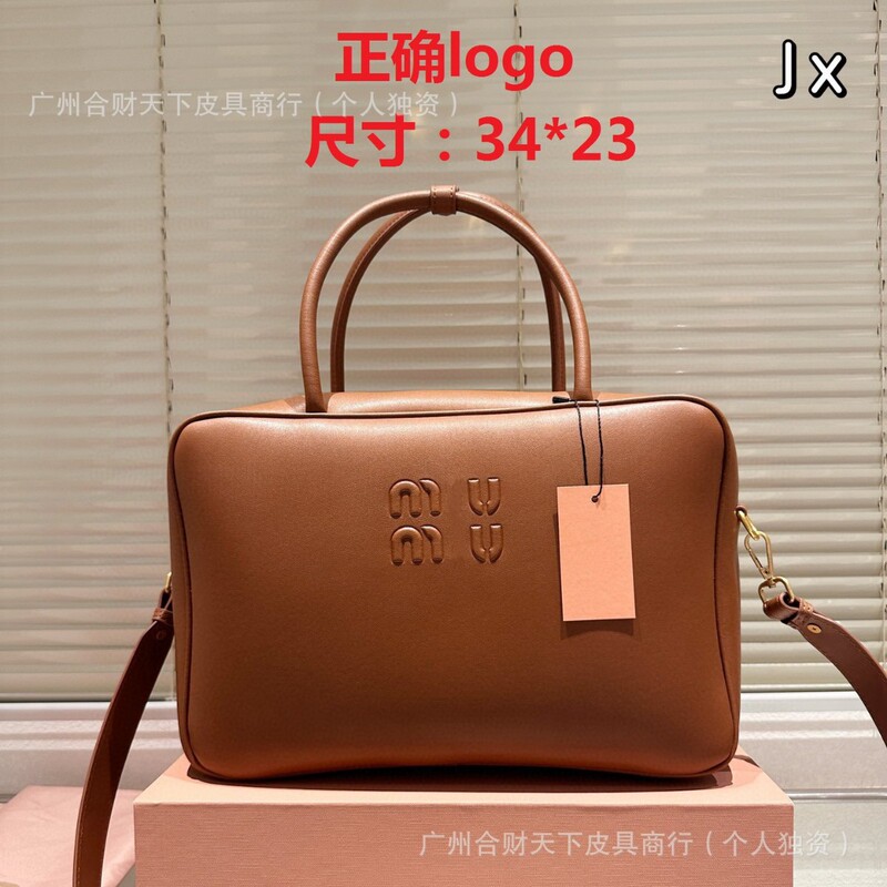 2024 autumn and winter new miu mujia cowhide portable bowling commuter briefcase women's computer bag large capacity bag