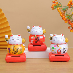 Creative solar waving hand lucky cat desktop car ornaments automatic waving car interior decoration