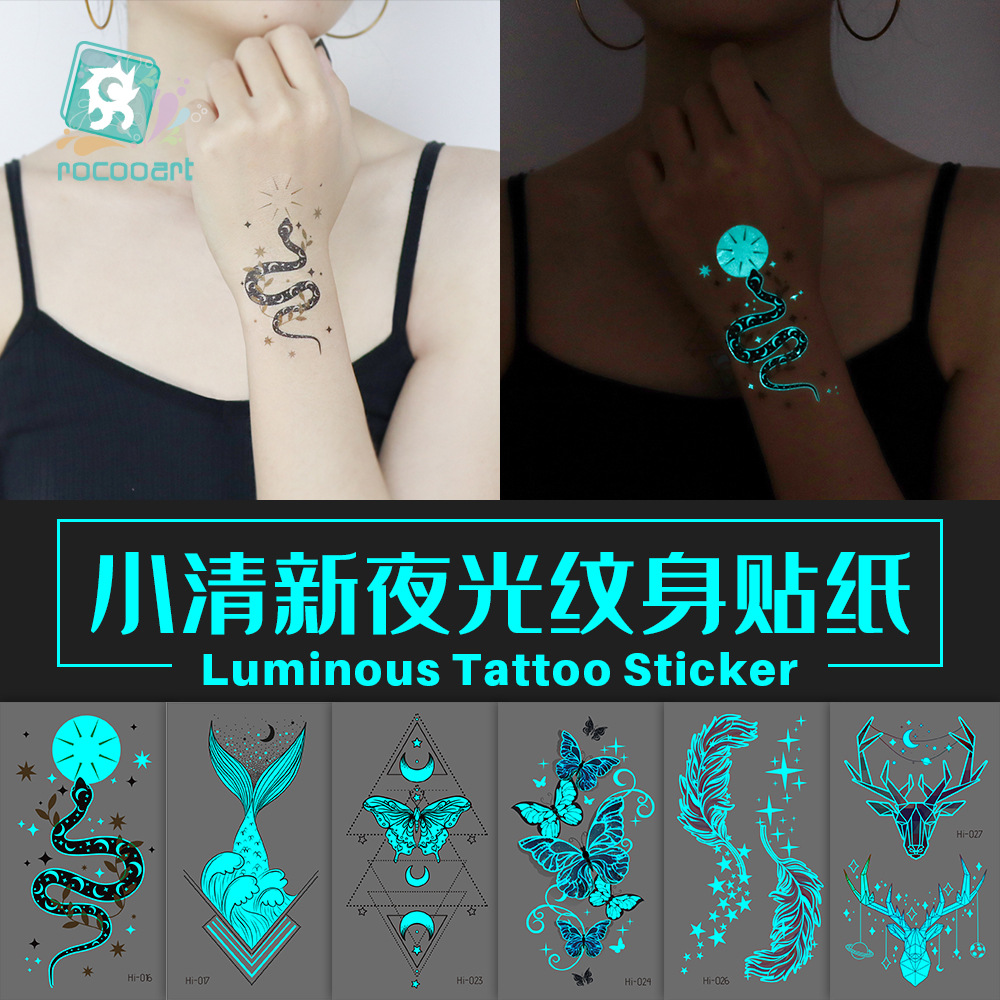 Nuevo azul transfronterizo impermeable luminoso tatuaje pegatinas Festival de Música fiesta brillante serpiente mariposa cara pegatinas tatuaje