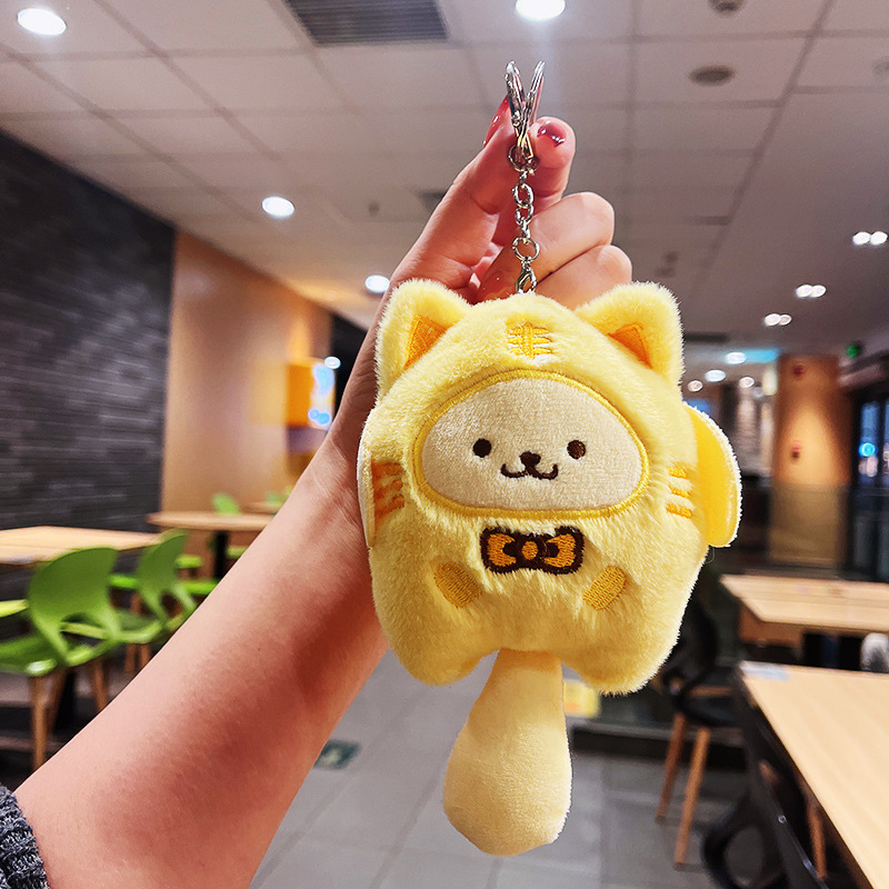ぬいぐるみのかわいいアクセサリーのぬいぐるみのペンダント卸売りのおもちゃの子供のかばんの漫画の子供の鍵は子供の機械をつかみます。