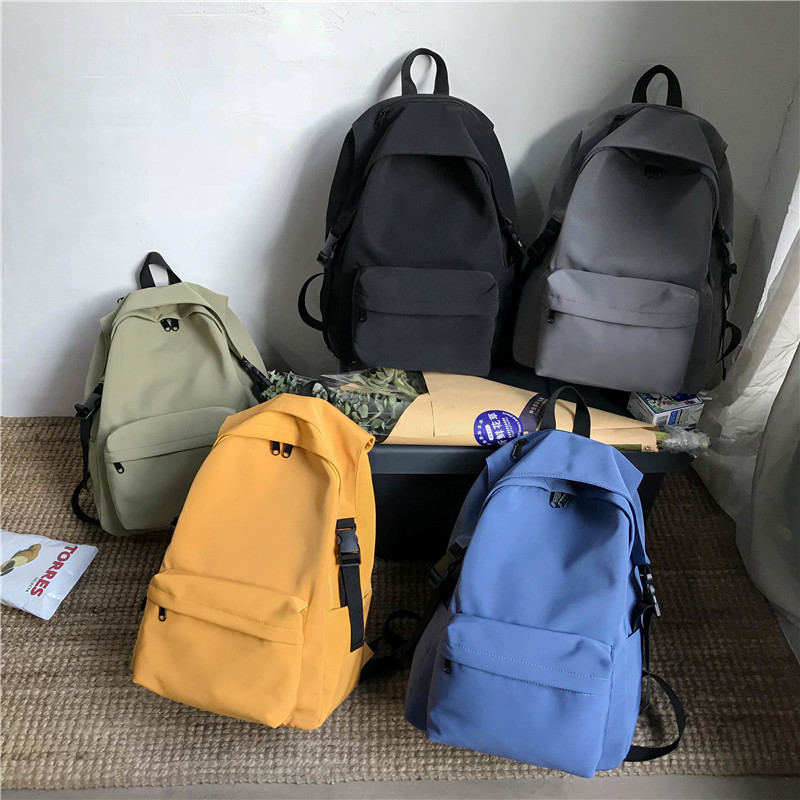 New Japanese and Korean Junior High School Student Bag Nylon Solid Color Anti Splashing Lightweight Backpack for College Students and Couples Backpack New Japanese and Korean Junior High School Student Bag Nylon Solid Color Anti Splashing Lightweight Backpack for College Students and Couples Backpack