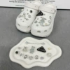 Thirteen sets of diamond bears