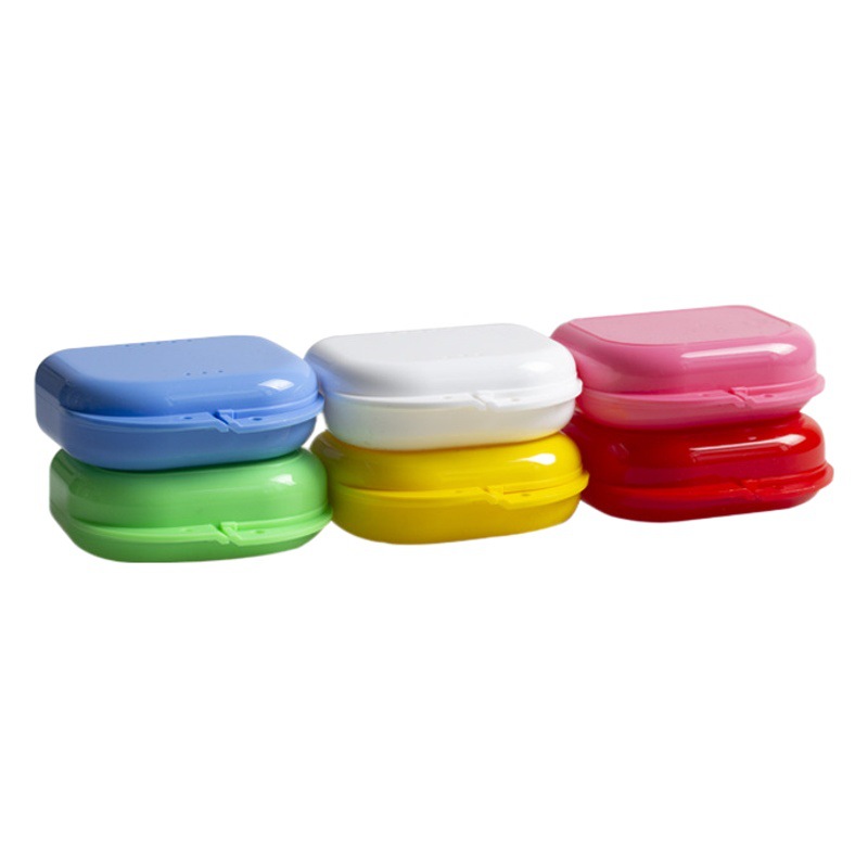 Caja de almacenamiento portátil para aparatos dentales invisibles de plástico, caja para guardar retenedores con orificios, venta al por mayor.