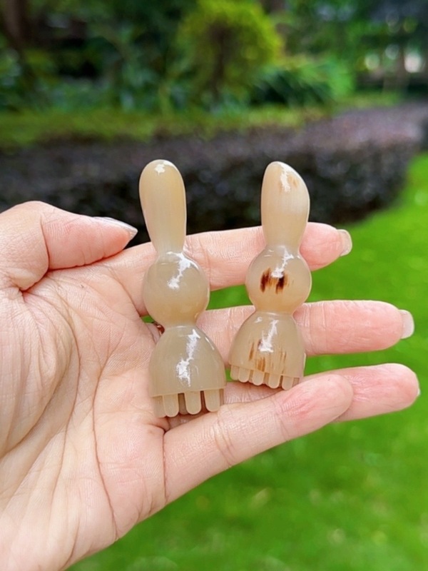 牛の角の小さい蓮の蓬の一体の多珠の目の部のマッサージのかわいい形の目の部の看護は筋の点穴を動かして水腫の目尻に行きます。|undefined