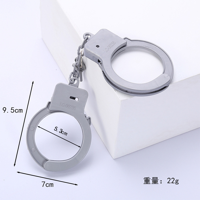 Esposas de Halloween Policía Juguetes de plástico Esposas Simulación de comercio exterior Esposas engañosas ordinarias con llaves