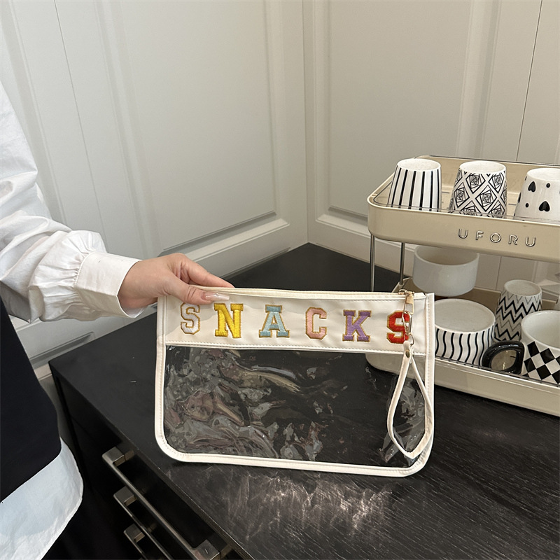 Tendencia transparente nueva impresión de letras bolsas de mano mujeres bordadas versátiles de gran capacidad de compras personalidades casuales